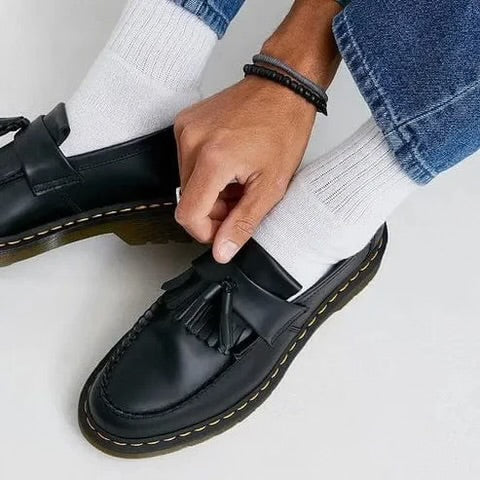 Elegant Black Leather Slip-On Loafers with Tassel Detail