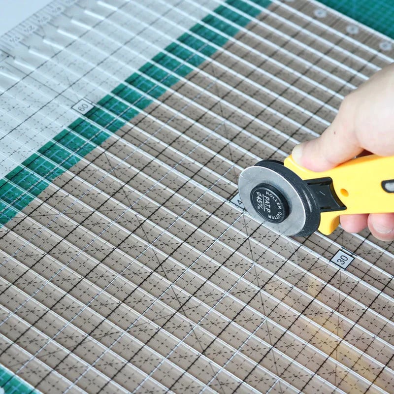 Fabric Cutter Clamp Cuts Up To Six Layers