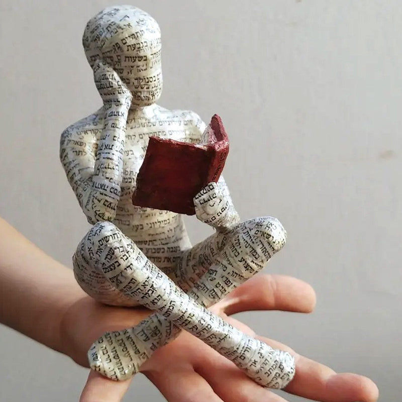 Reading Figurine Handcrafted Resin Newspaper Print