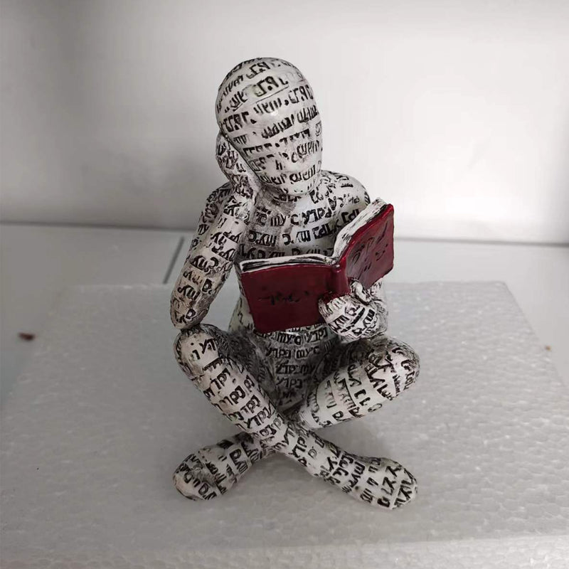 Reading Figurine Handcrafted Resin Newspaper Print