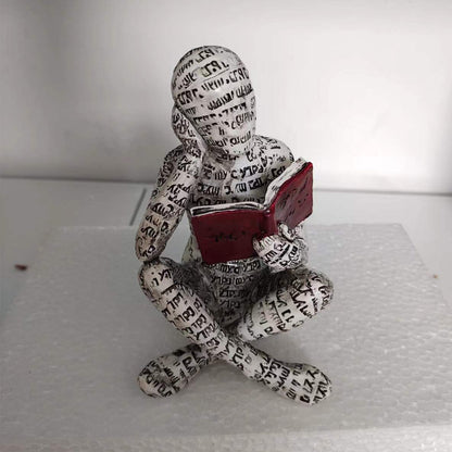 Reading Figurine Handcrafted Resin Newspaper Print
