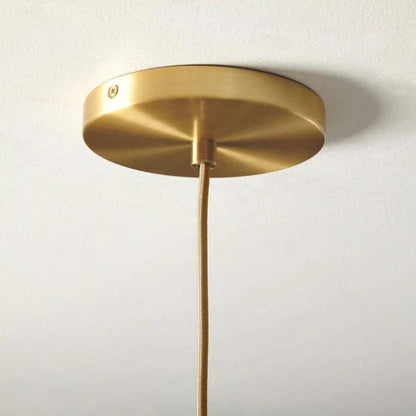 Elegant Glass Sphere Hanging Light in Chic Brass Finish