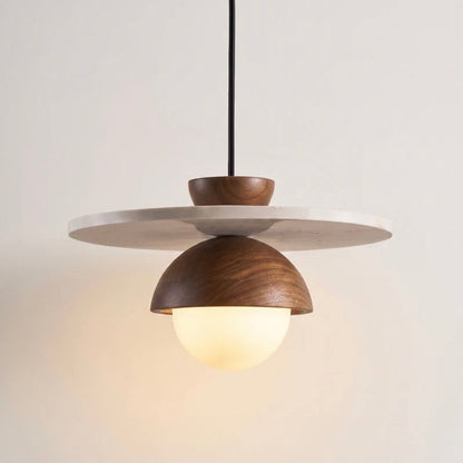 Illuminating Globe Pendant Lamp with Natural Elements