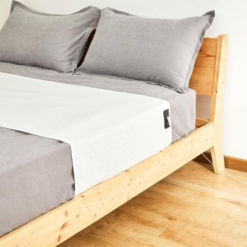 Grounding Fitted Bed Sheet for Enhanced Sleep Quality