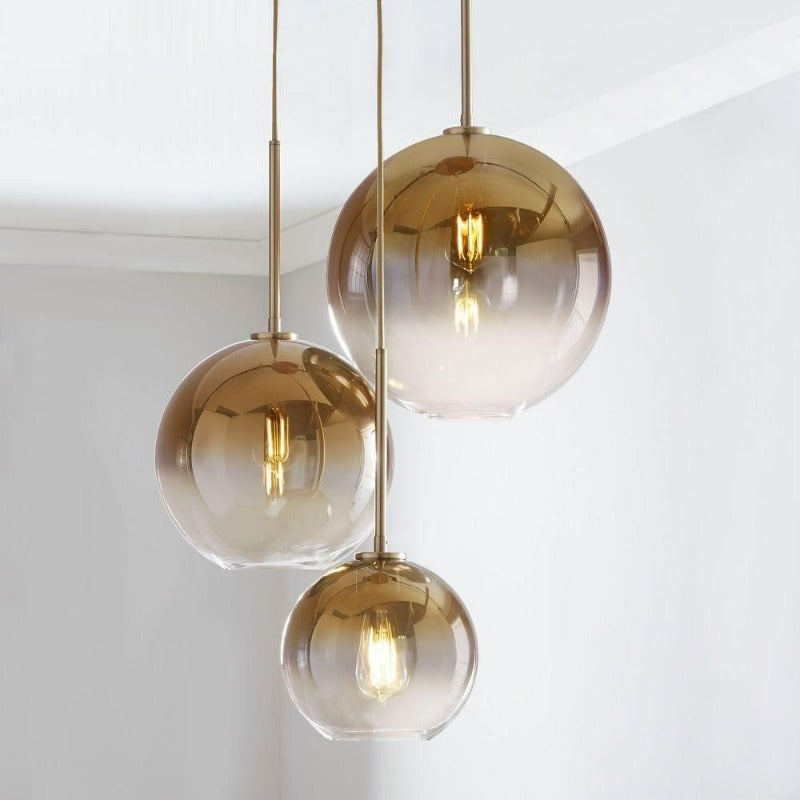 Elegant Glass Sphere Hanging Light in Chic Brass Finish