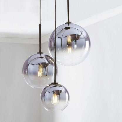 Elegant Glass Sphere Hanging Light in Chic Brass Finish