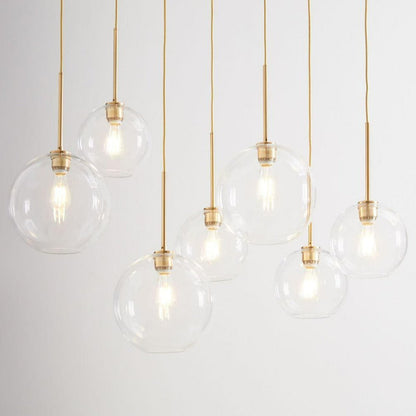 Elegant Glass Sphere Hanging Light in Chic Brass Finish