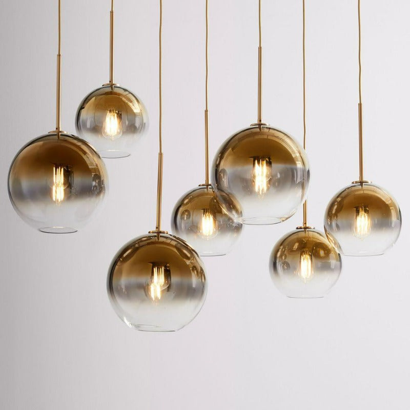 Elegant Glass Sphere Hanging Light in Chic Brass Finish