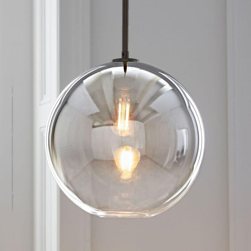 Elegant Glass Sphere Hanging Light in Chic Brass Finish