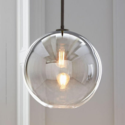 Elegant Glass Sphere Hanging Light in Chic Brass Finish