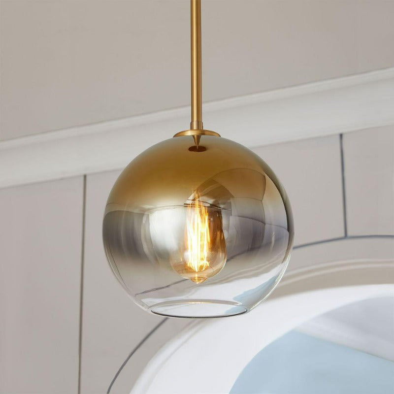 Elegant Glass Sphere Hanging Light in Chic Brass Finish